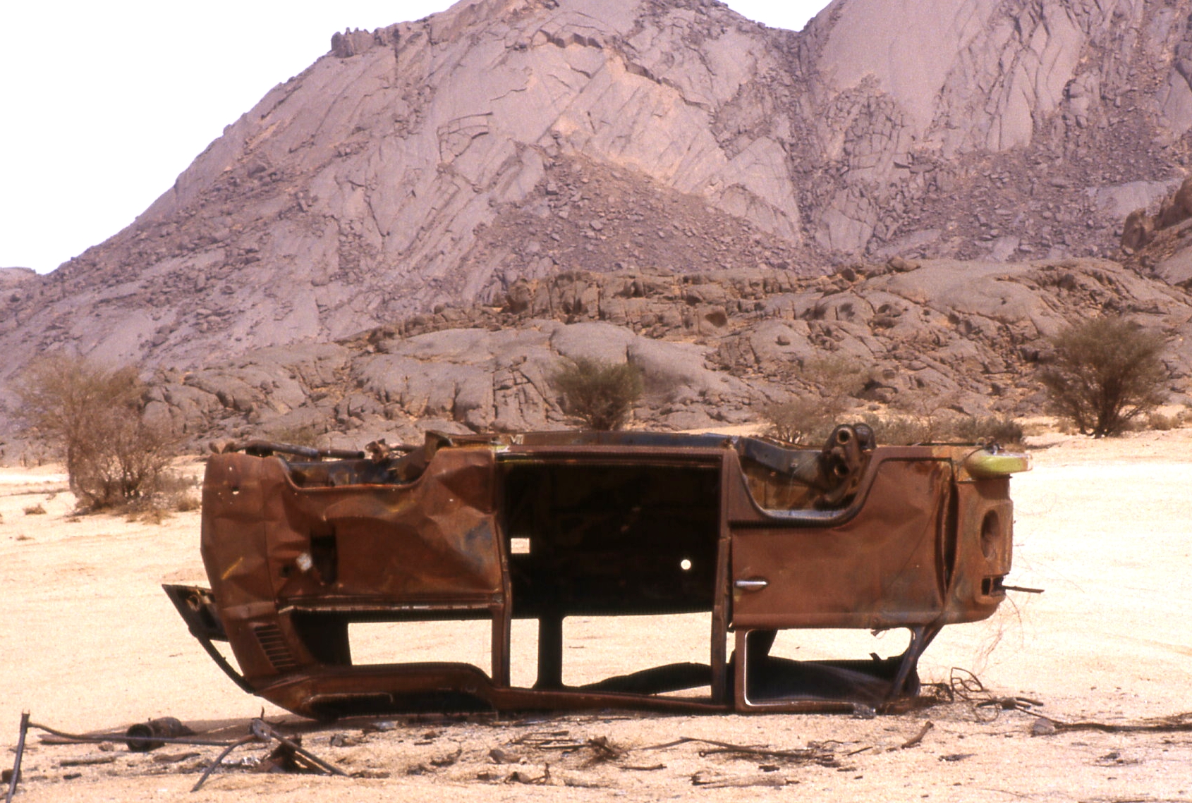 AlgeriaSahara-CarWrecks-ToppledBusVW--a30l.jpg