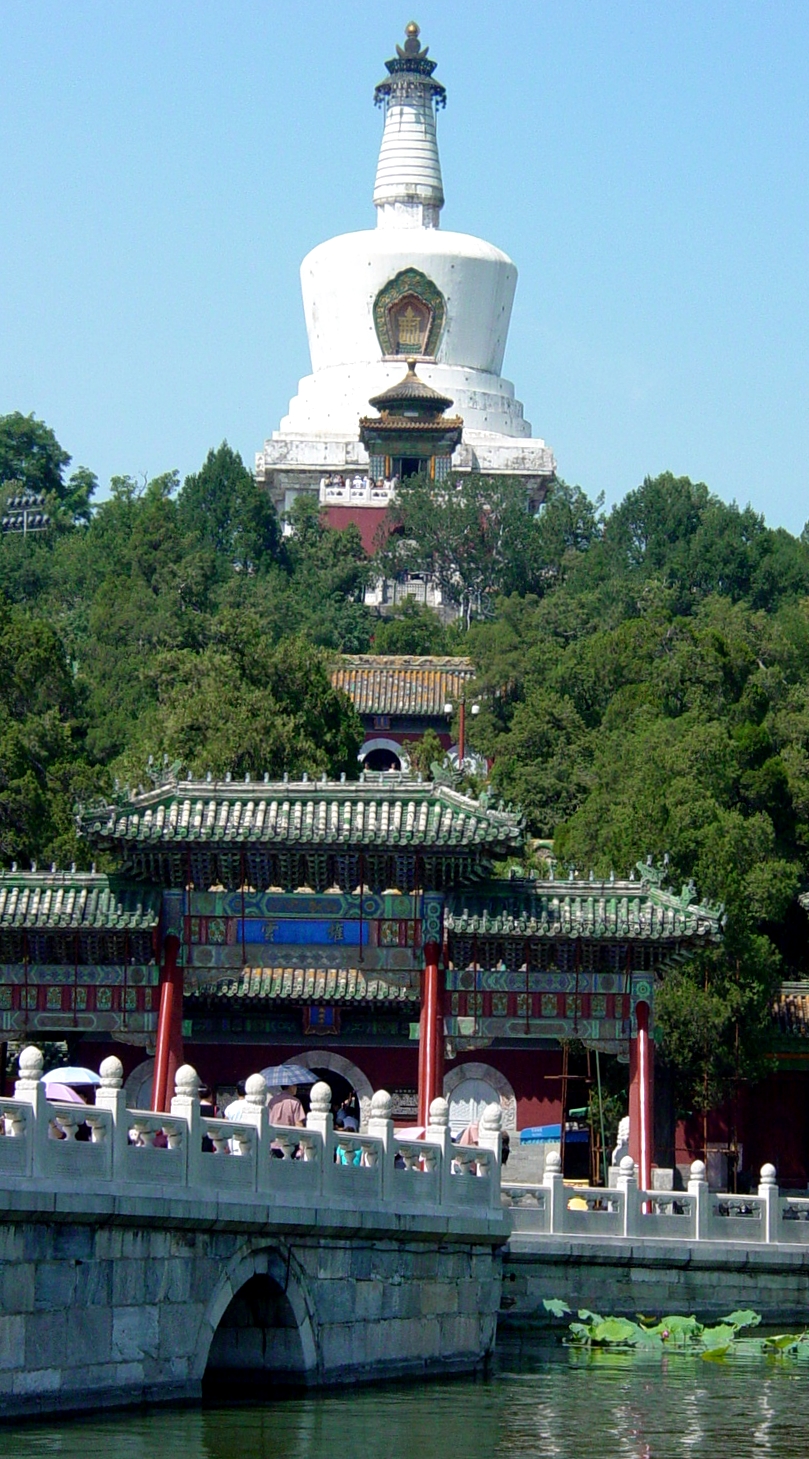 White temple above lake