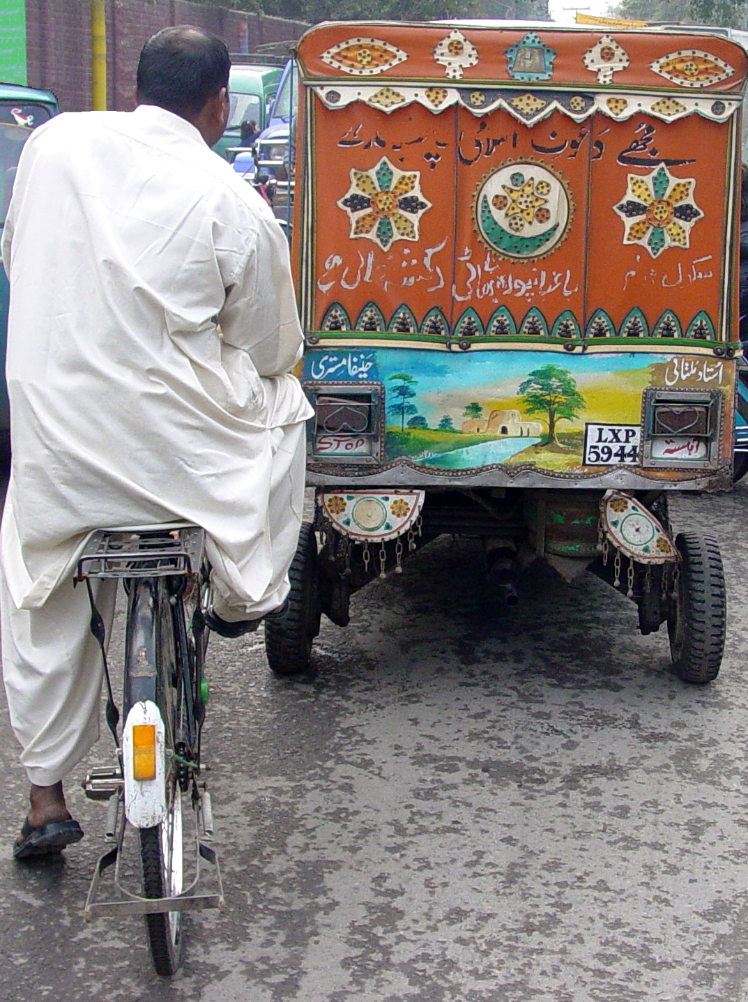 Cyclist and taxi