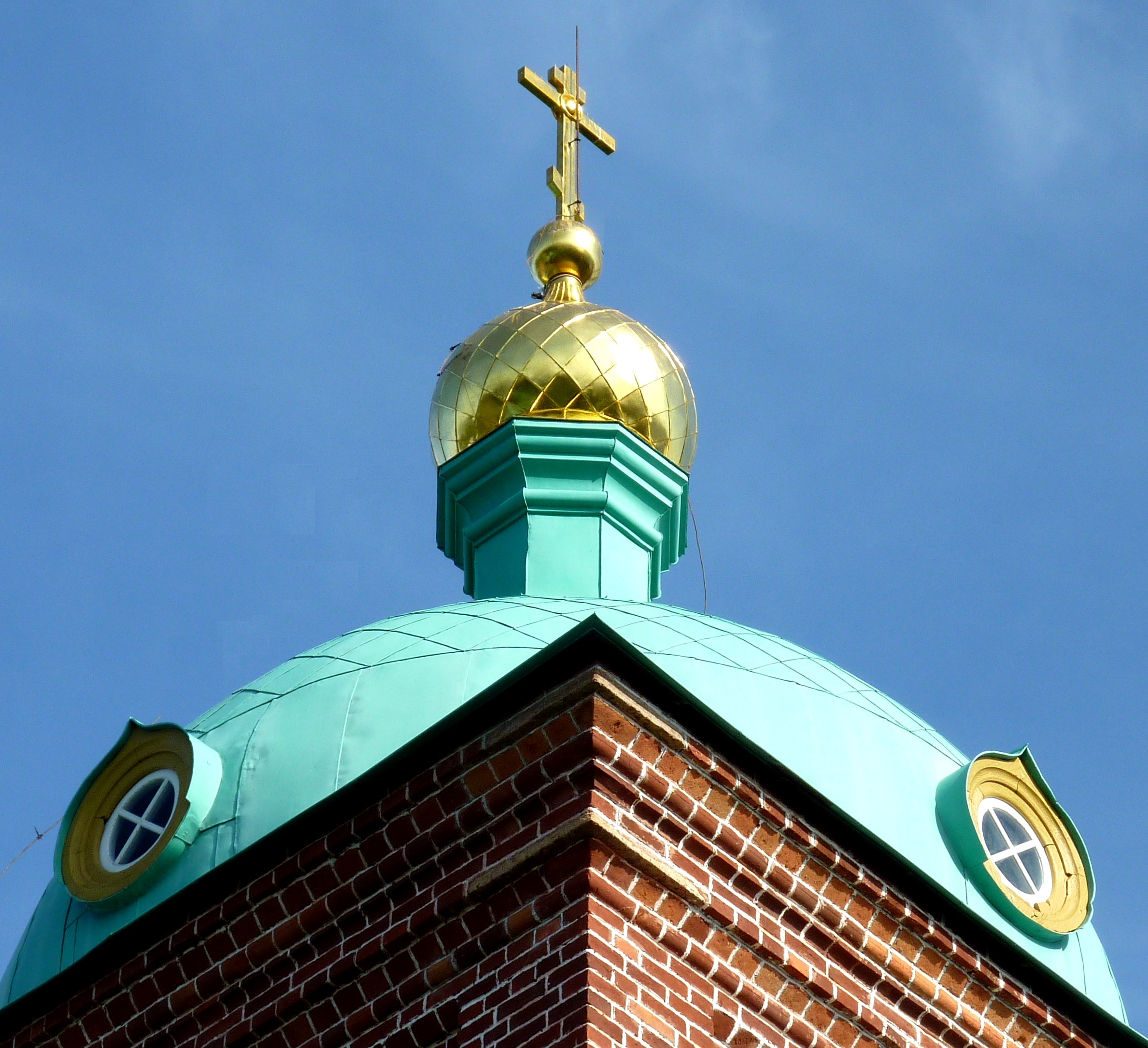 Church tower with golden spire
