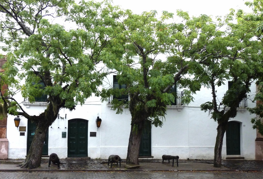 Old townhouses with some canons in front